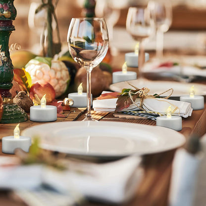 Flameless Tea Lights Candles - Realistic LED Flickering Operated Tea Lights Steady Battery Tealights Long Lasting Electric Fake Candles in White 24Pcs Decoration for Party and Gifts Ideas